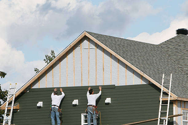 Professional Siding Contractor technician working in Greens Fork, IN